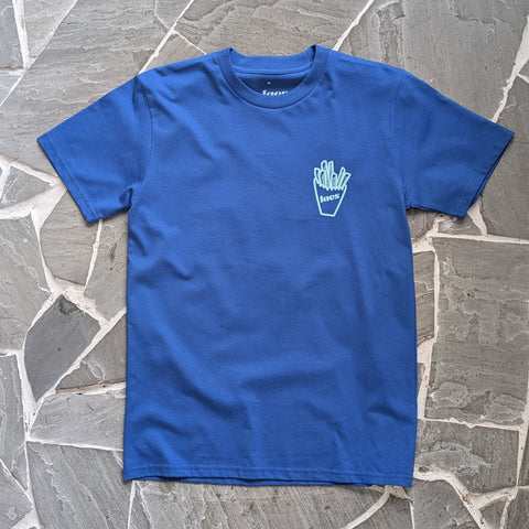 Blue t-shirt with a small white logo on a gray stone surface