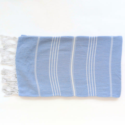 sky blue towel with white stripes on a white background